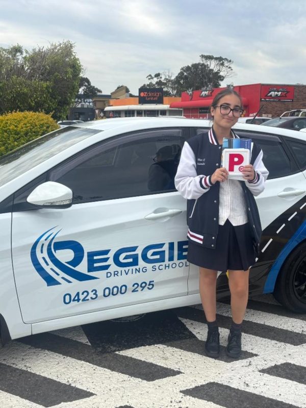 Learner driver practising kerb-side stop and 3-point turn for driving test preparation in Wollongong